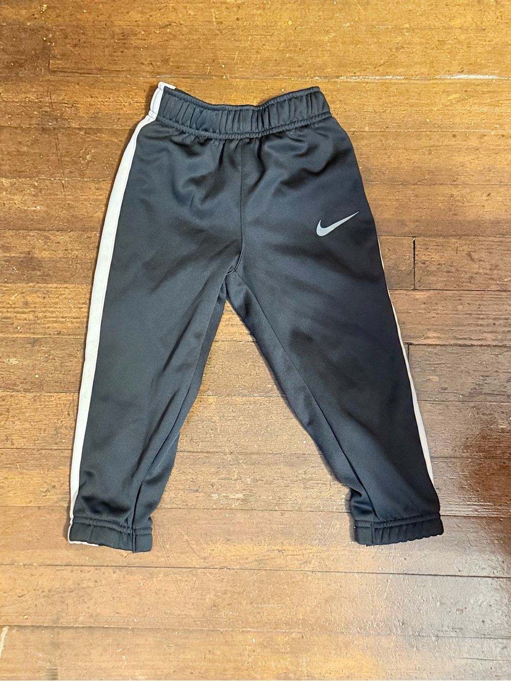 Nike Toddler Black Joggers with White Side Stripes